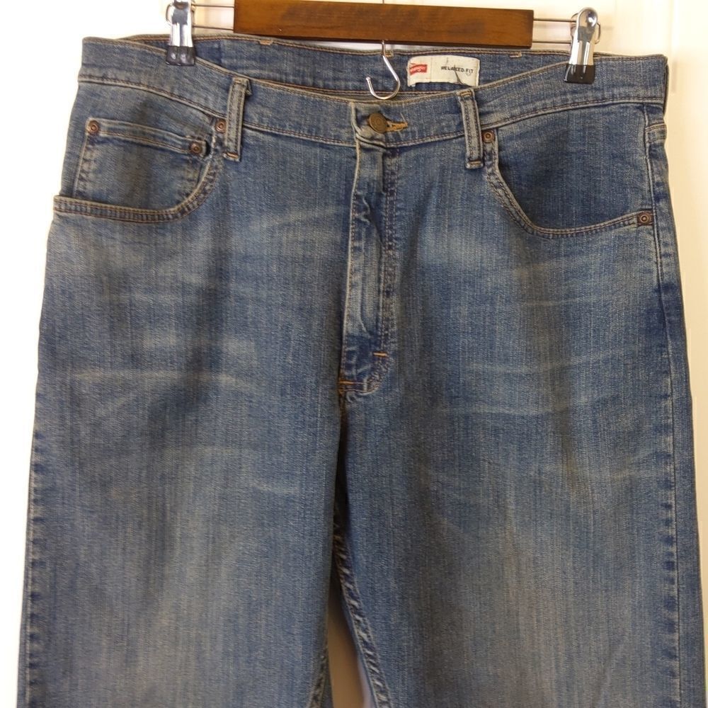 (3/$20) Wrangler premium relaxed it five pocket mildly distressed jeans